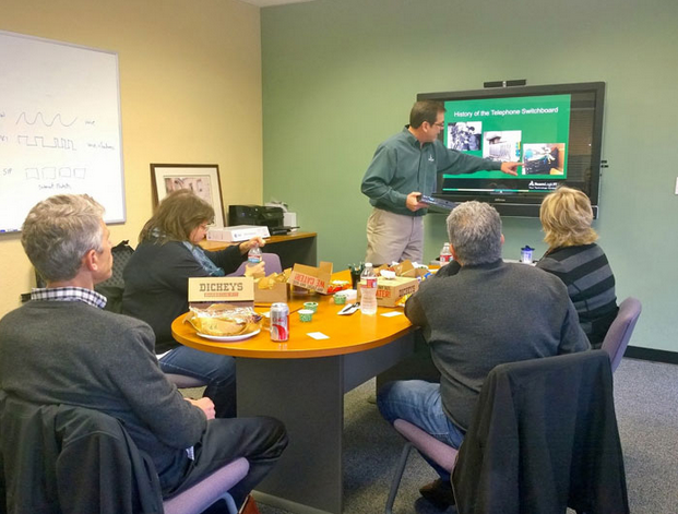 Jon Simms of TeamLogic IT of Mountain View gives a presentation about business phone systems. / IT boost
