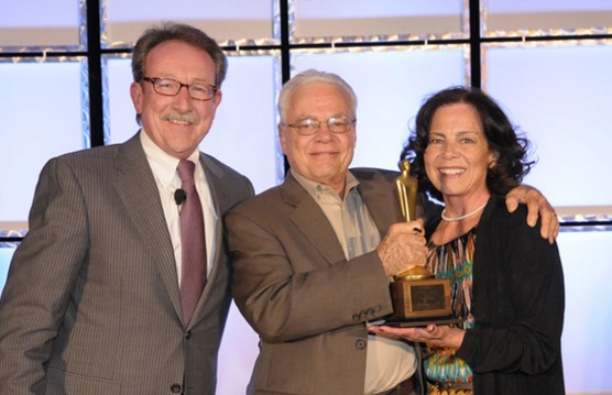 TeamLogic IT President chuck Lennon, left, with 2013 Franchisees of the Year Davis and Barbara Merrey.