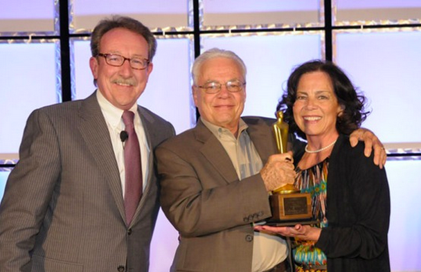 TeamLogic IT President Chuck Lennon, left, at CompTIA with 2013 Franchisees of the Year Davis and Barbara Merrey.