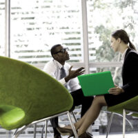 TeamLogic IT Franchise two people talking